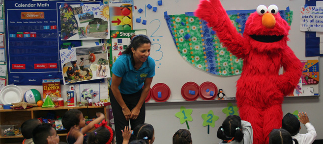 Elmo gives a helping hand
